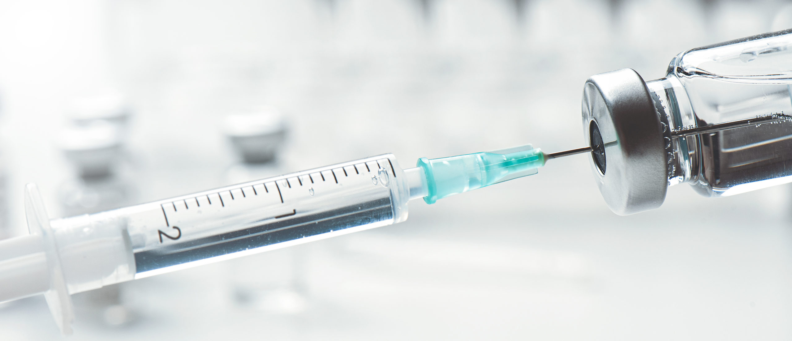 Vaccine bottle and syringe. Influenza, flu, corona virus vaccine concept